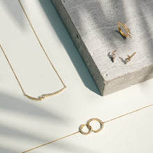 Load image into Gallery viewer, GIANNA | White Sapphire Swirl Huggie Hoop by Aurelie Gi — on model