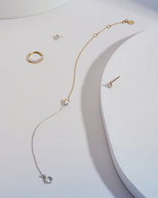 Load image into Gallery viewer, SANILIA | Two-Tone Bezel Pear Lab Grown Diamond Stud Earring by Aurelie Gi — alternate angle