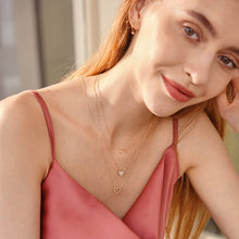 Load image into Gallery viewer, JULIETTE | Interlocked Hearts Necklace by Aurelie Gi — on model