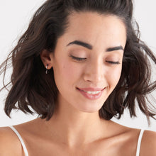 Load image into Gallery viewer, Silver Glow Huggie Hoops