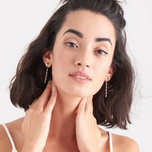 Load image into Gallery viewer, Silver Glow Drop Huggie Hoops