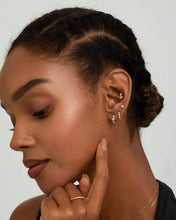Load image into Gallery viewer, ZARINA | Pear and Round Lab Grown Diamond Single Huggie by Aurelie Gi — on model
