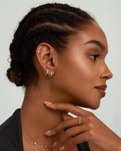Load image into Gallery viewer, ADALYNN | Pear and Round Lab Grown Diamonds Pair Stud Earrings by Aurelie Gi — on model
