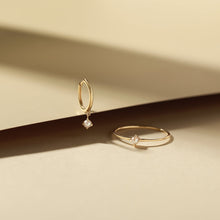 Load image into Gallery viewer, HELENA | Single White Pearl Dangle Huggie Hoop by Aurelie Gi — on model
