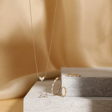 Load image into Gallery viewer, Delaney | Baguette and Round White Sapphire Hoop by Aurelie Gi — on model
