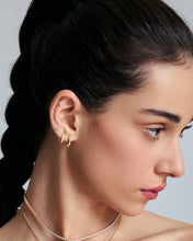 Load image into Gallery viewer, Celestial Domed Lab Grown Diamond Single Huggie Hoop by Aurelie Gi — on model
