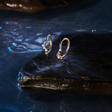 Load image into Gallery viewer, LANA | Pearl and White Sapphire Curved Huggie Hoops by Aurelie Gi — alternate angle
