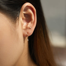 Load image into Gallery viewer, HELENA | Single White Pearl Dangle Huggie Hoop by Aurelie Gi — detail view
