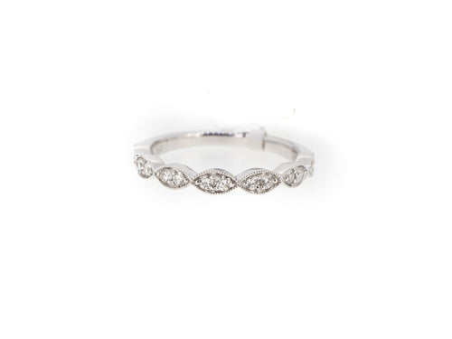 pear half eternity ring